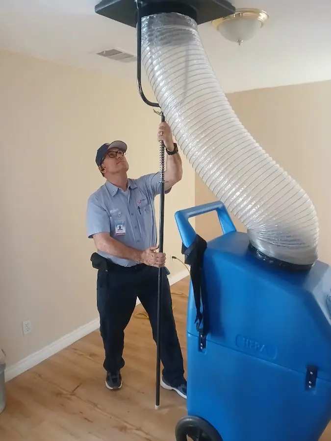 Furnace Tune-Up technician using HEPA equipment in Villa Hills